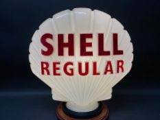 A rare Shell Regular glass petrol pump globe, by Hailware, repainted lettering and chip to neck