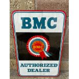 A BMC Authorized Dealer tin advertising sign, 18 x 27".