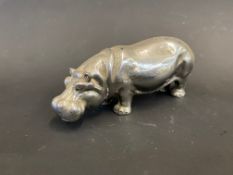 A good quality accessory car mascot in the form of a standing hippo, chrome plated finish.