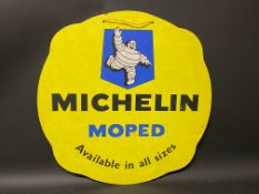 A Michelin Moped hardboard advertising sign, 20 3/4 x 21".