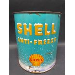 A Shell Anti-Freeze cylindrical gallon can of bright colour.