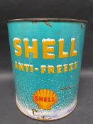 A Shell Anti-Freeze cylindrical gallon can of bright colour.