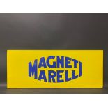 A Magneti Marelli enamel sign in good condition, 36 x 14 1/2".