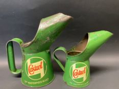 A Wakefield Castrol Motor Oil quart measure and a similar half pint measure.