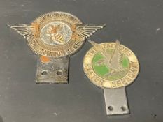 A Coventry Speedway car badge and a second for the Falcons Exeter Speedway.