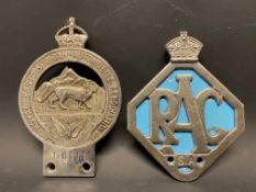 A Royal East African Automobile Association badge no. L8111 plus a second RAC South African badge.