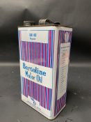 A Bartoline Motor Oil gallon can.