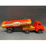 A Brimtoy tinplate and plastic model of an articulated Esso petrol tanker.