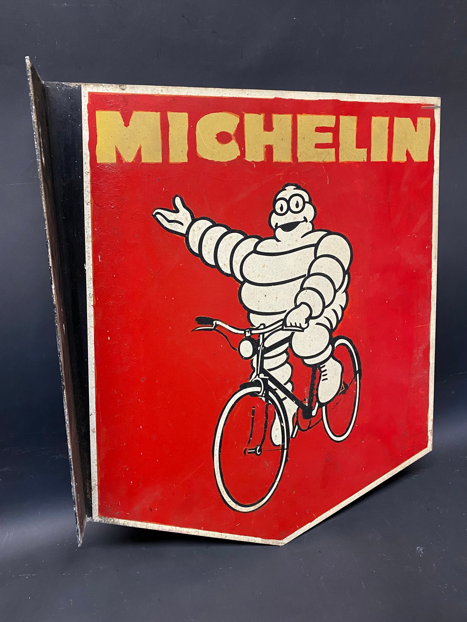 A Michelin pictorial double sided aluminium advertising sign with hanging flange, the red repainted,