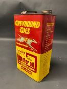 A Greyhound Oils gallon can.