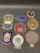 A tray of assorted car badges to include Cyprus Motor Club and Singapore Motor Club.