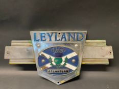 A Leyland Albion Atlantean radiator plaque with Scottish flag and thistle to the centre, 15 x 7 1/