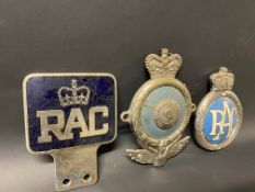 Three RAC car badges.