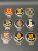Nine car badges, mostly county related, also the Rafmain Motor Club etc.