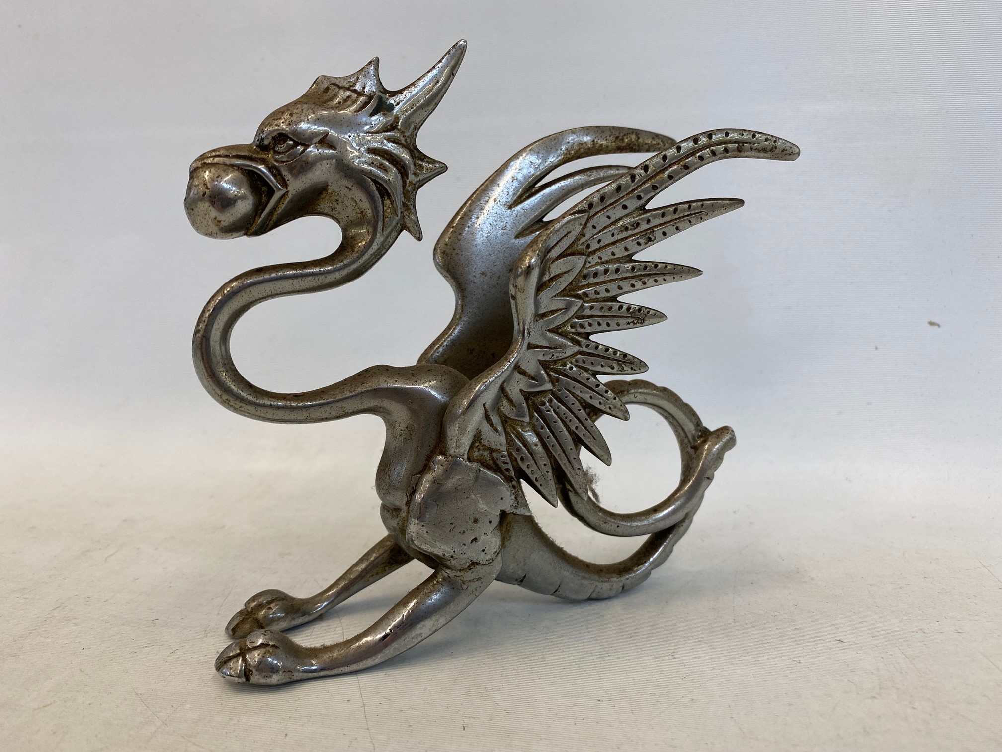 A chrome plated car mascot in the form of a griffin or dragon. - Image 2 of 2