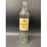 A Shell Rotella Oil quart glass bottle.