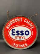 An Esso Ethyl circular double sided illuminated lightbox advertising Harrison's Garage, Totnes, 24