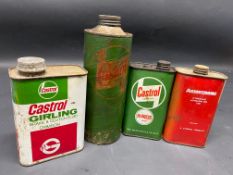 A Wakefield Castrol Motor Oil quart cardboard can, a Castrol Girling can and two others.