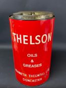 A Thelson Oils & Greases five gallon cylindrical drum in good condition.