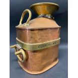 A Chekpump weights and measures copper and brass mounted half gallon measure from the County of