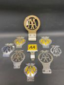 A tray of assorted AA badges including a reproduction Stenson Cooke type badge.