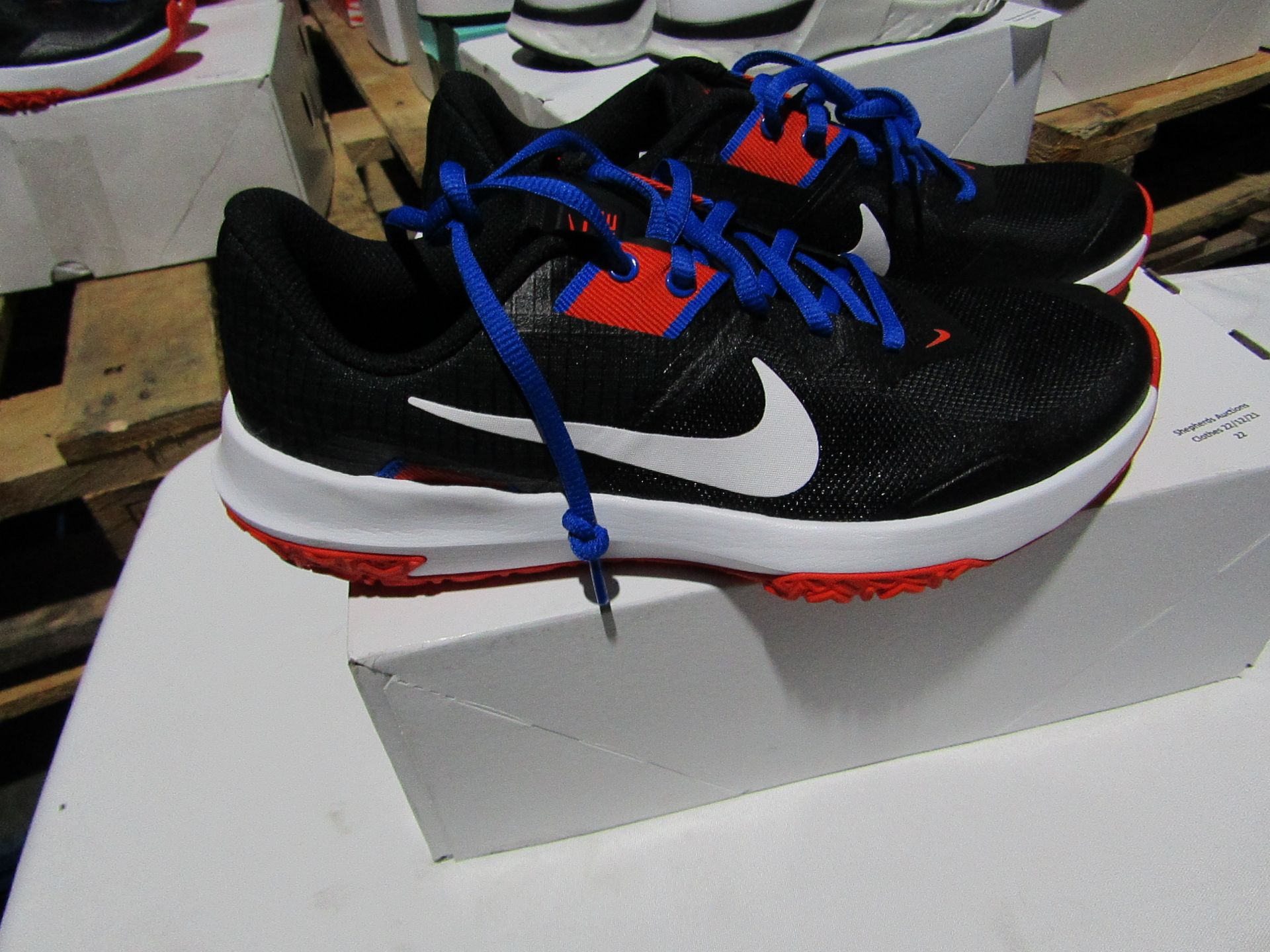 Nike Black and Orange running trainers, new and boxed, Size 7.5 Uk