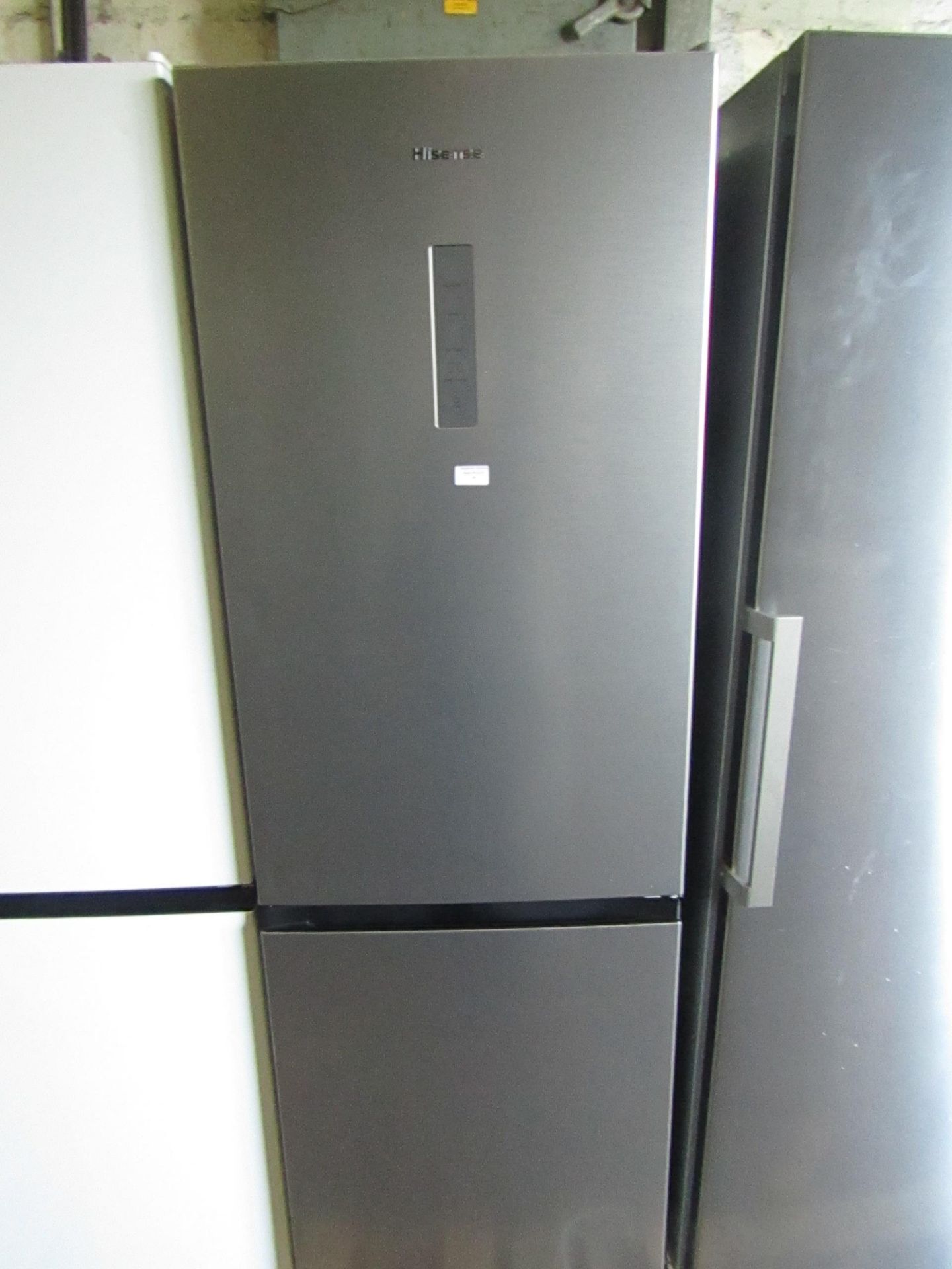 Hisense Free Standing Tall Fridge Freezer. Stainless Steel, Item Is Tested Working And Appears To Be