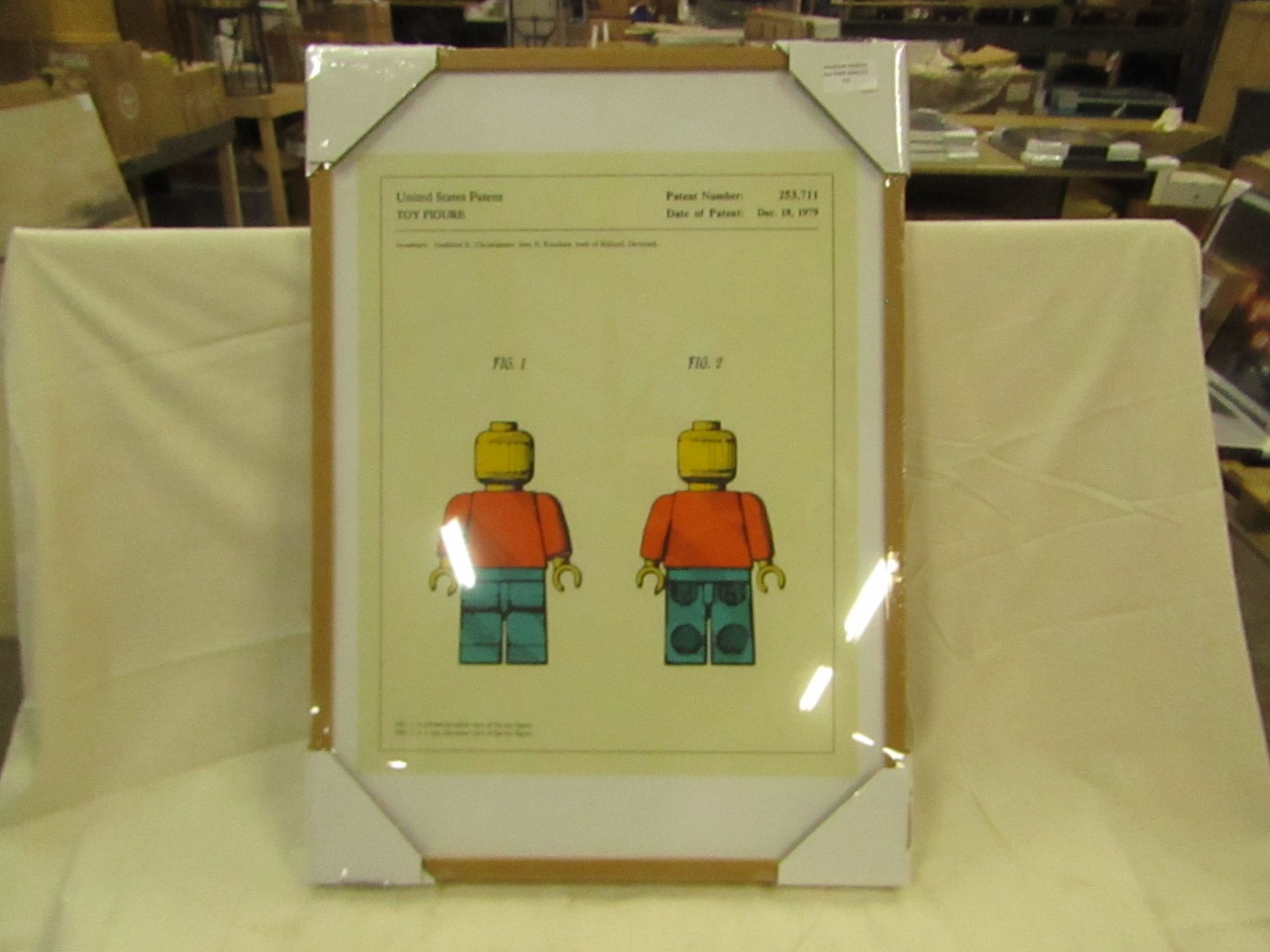 1 x Made.com Retro Patent Toy Figure Framed Wall Art Print A2 Multi RRP £69 SKU MAD-AP-