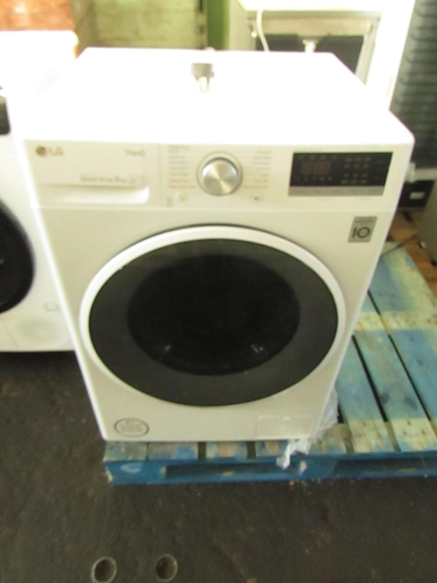LG F4V508WSE 9KG washing machine, Powers on and spins but we have not tried any other functions