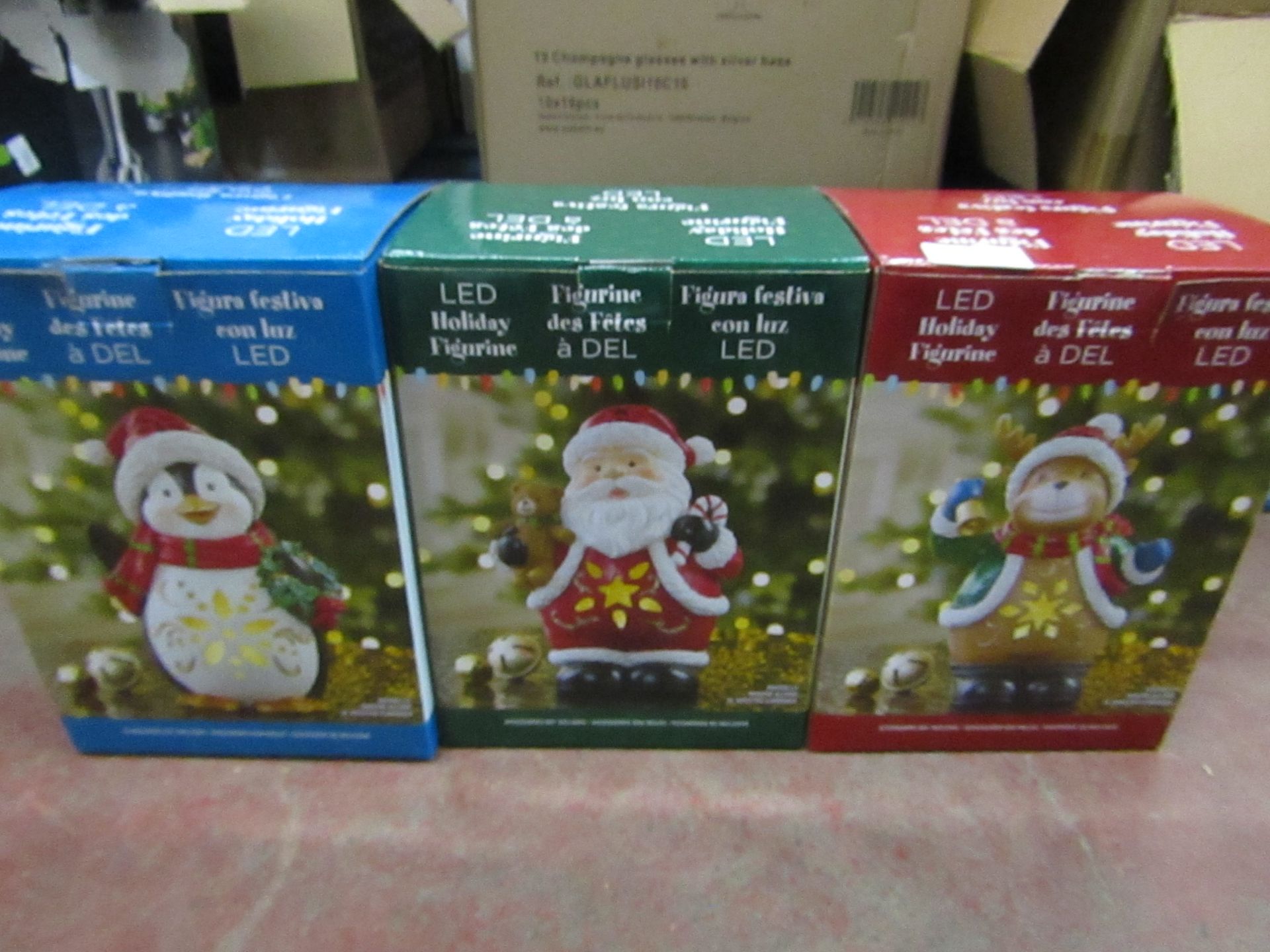 Set of 3 Led Holiday Figures, Unchecked and boxed