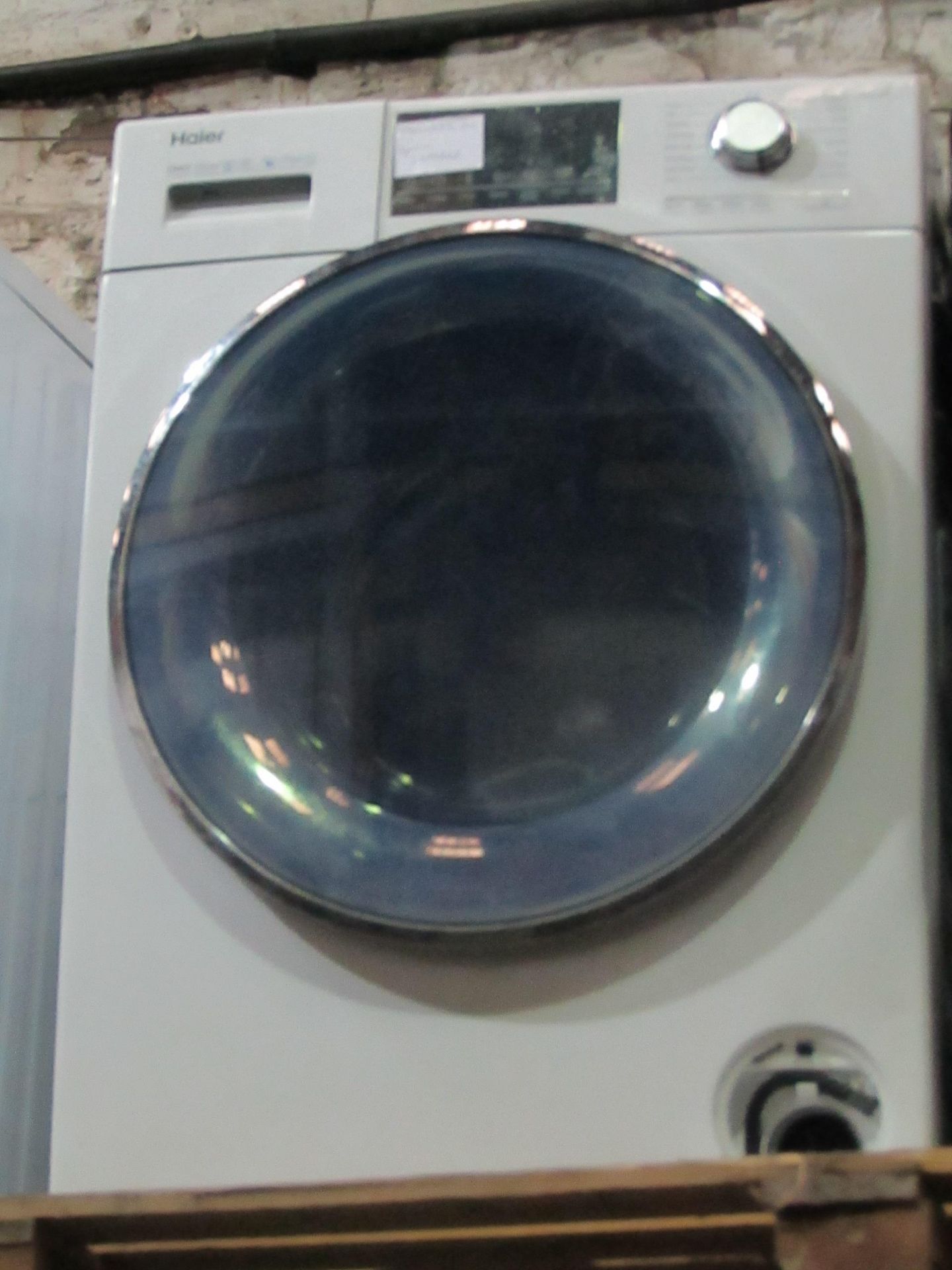 Haier washing machine, powers on but spin untested.