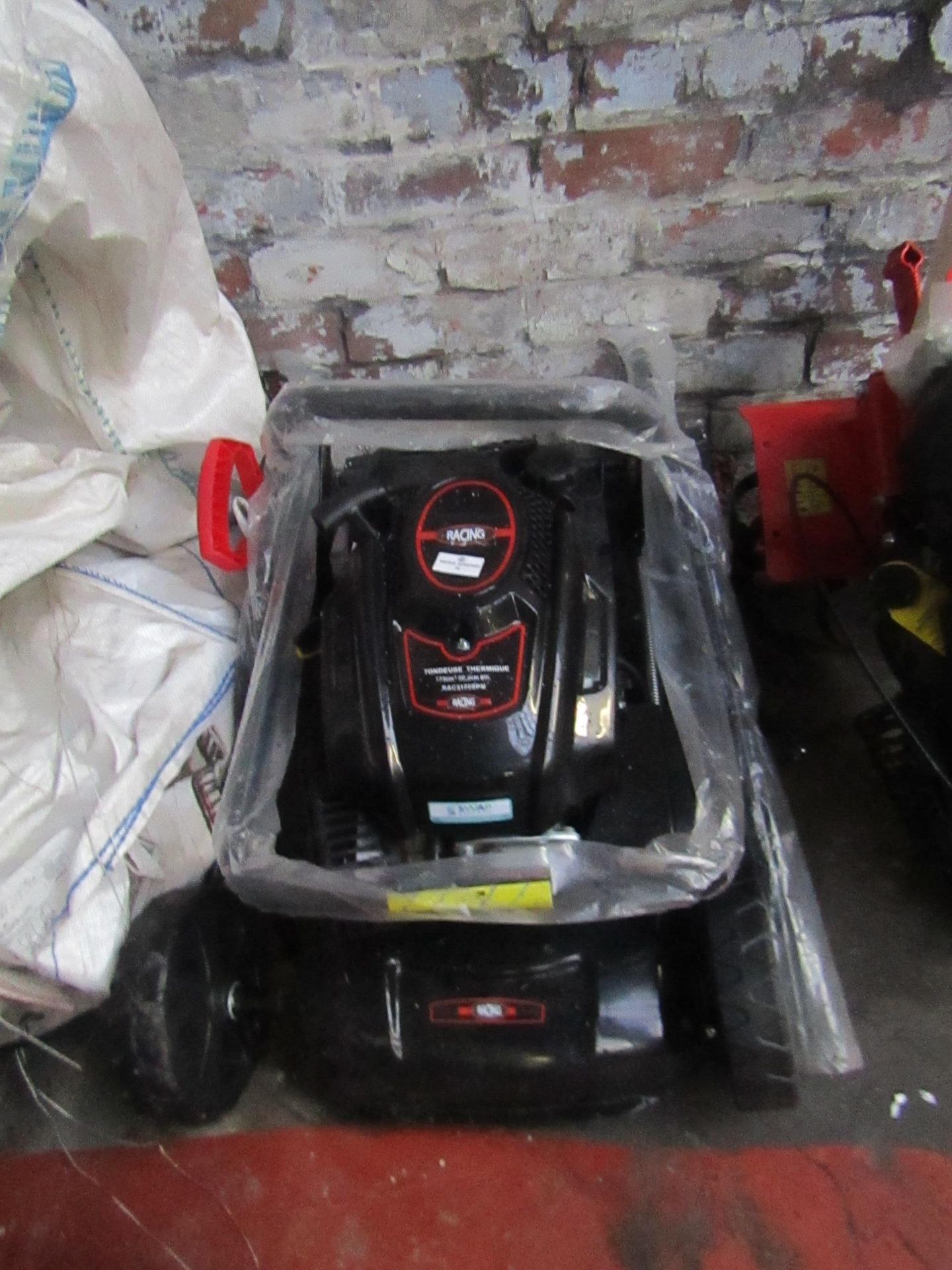 Racing RAC5175SPM petrol lawn mower, Unchecked and Untested this item is a return and the