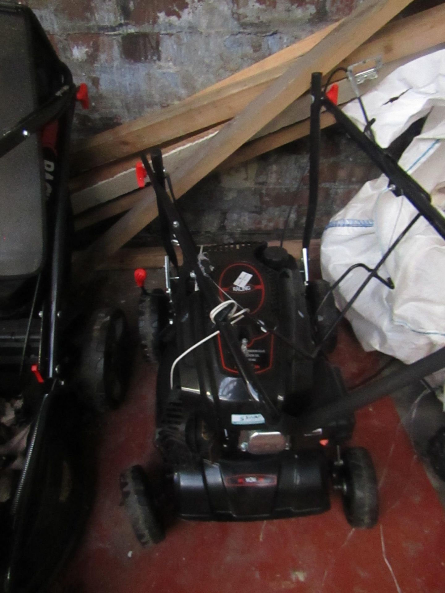 Racing 4000T petrol lawn mower Unchecked and Untested this item is a return and the condiiton can