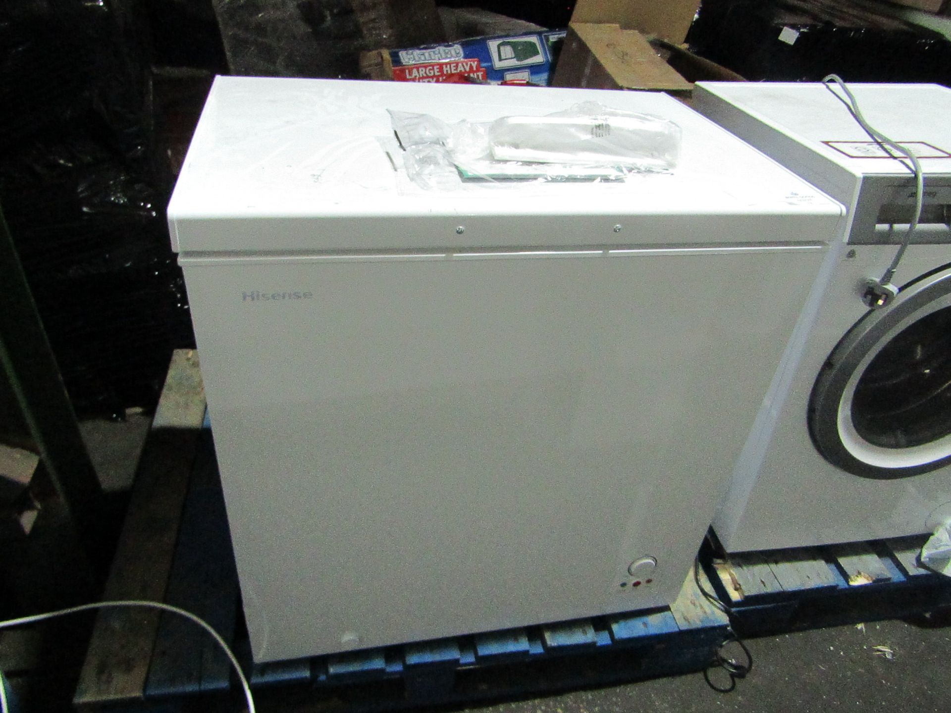 Hisense Chest Freezer. Tested working but has a few scratches on the top and front corner. Looks