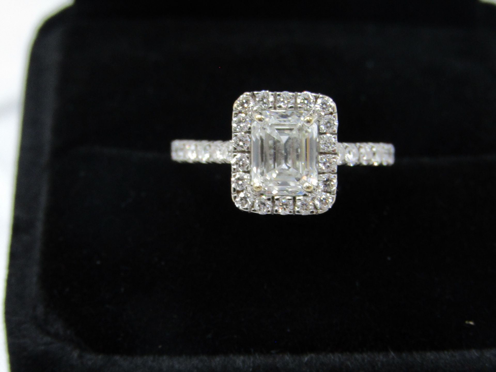 **10% Special Commission on this lot **ÿAn Emerald Cut 1.5cts VS1 Halo Set Synthetic Lab Diamond