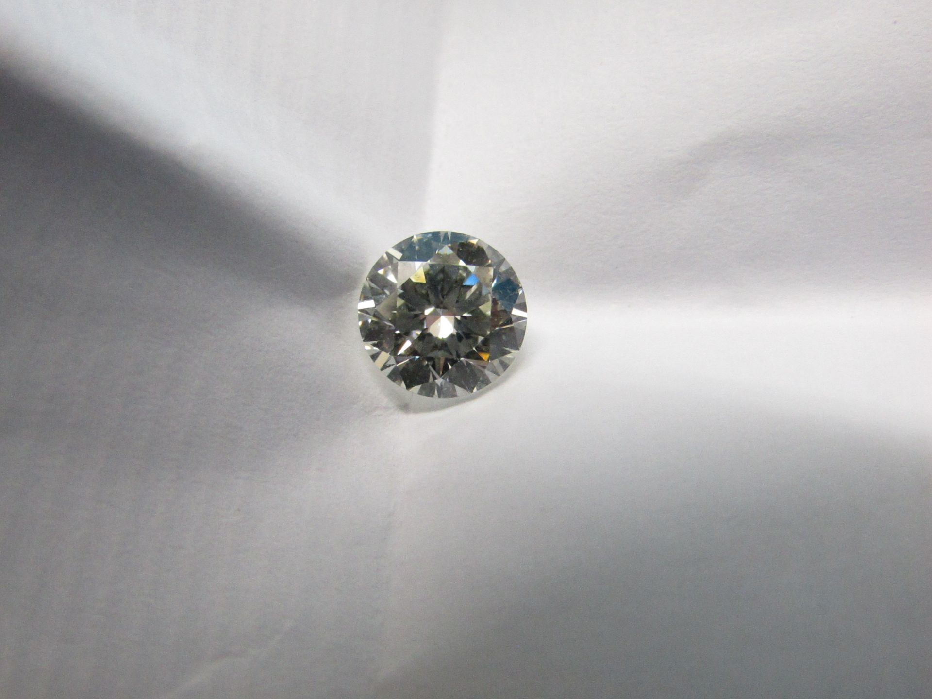 1.01 Carat round Brilliant cut, VS1, colour J, Synthetic Lab Diamond, comes with a IGI Certificate.