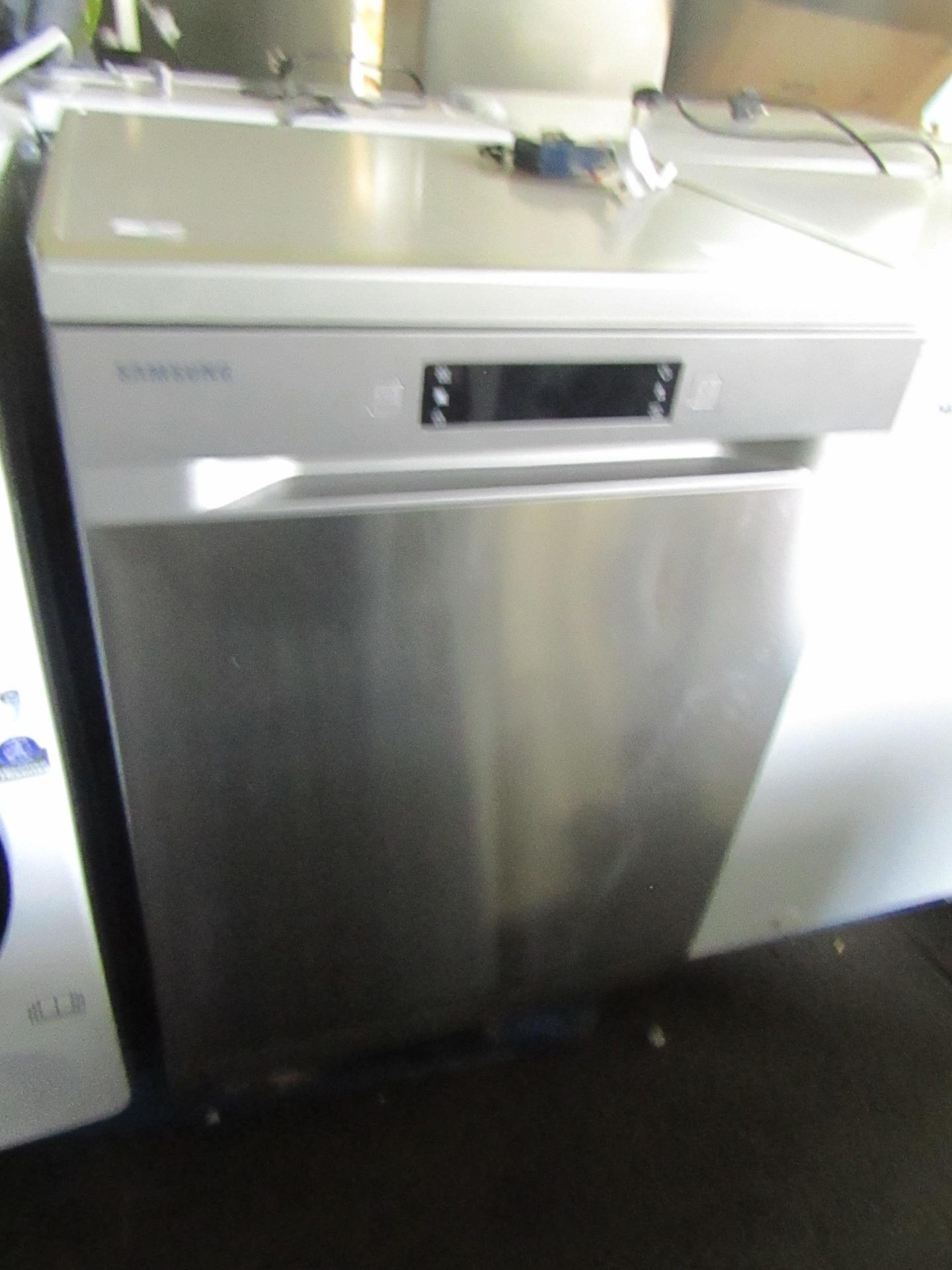 Samsung Dishwasher, Powers on, we haven't connectr3ed it to water to check any further