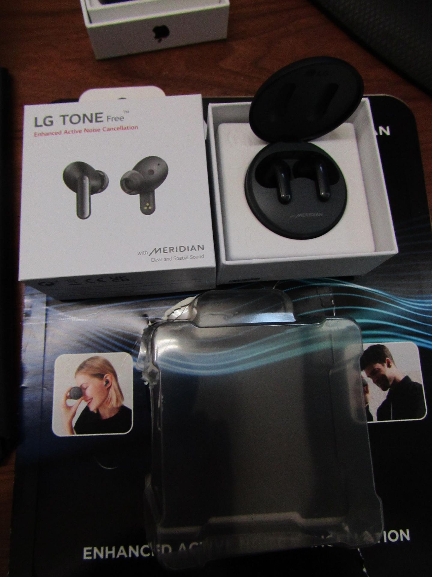 LG UFP5 Wireless earbuds with charging case and outer box, tested working for sound with the power