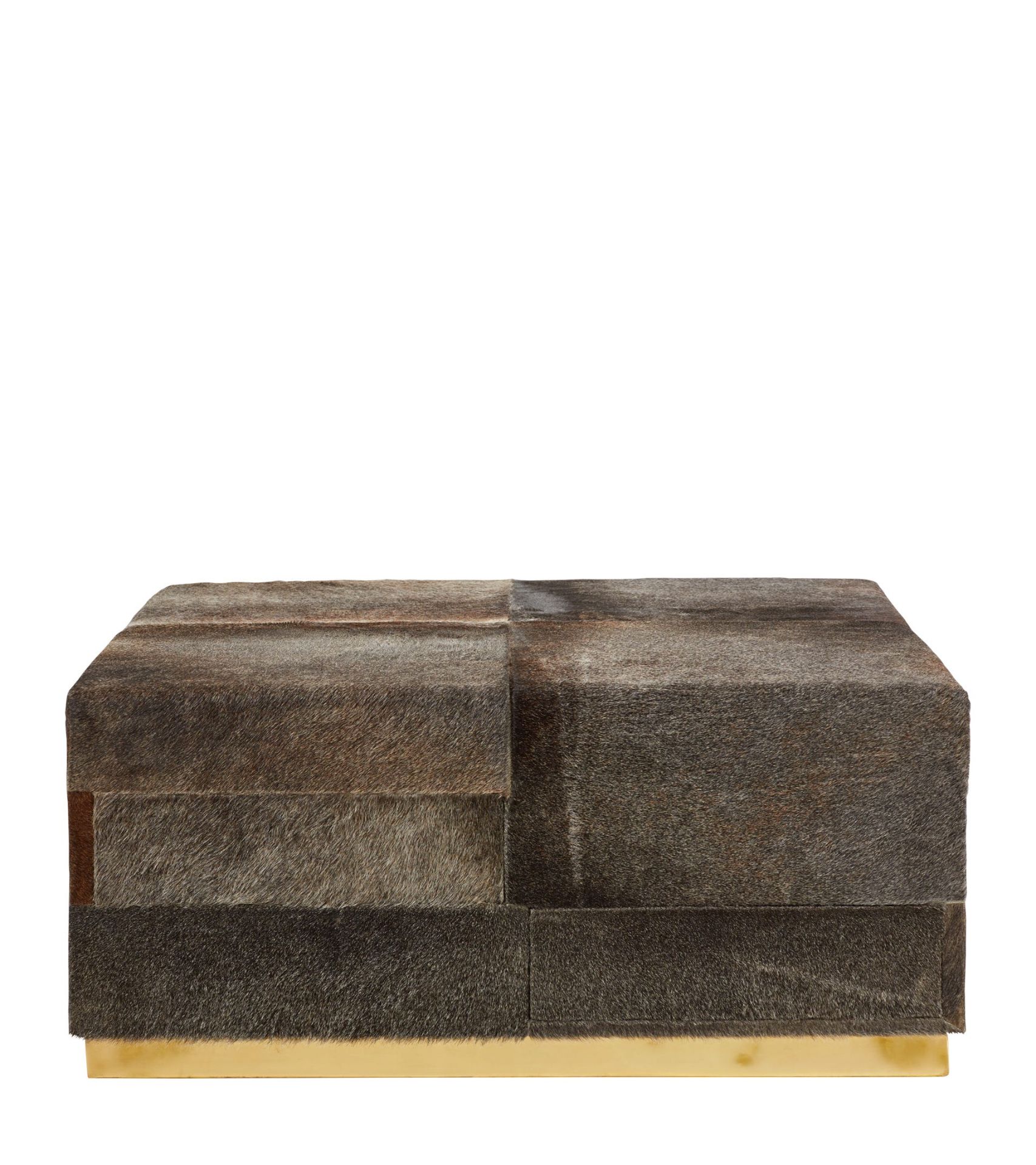 OKA Locke Ottoman The features of this unusual cowhide ottoman extend beyond its comfortable