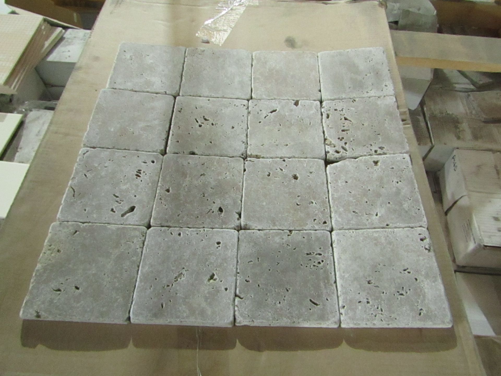 10x Boxes of 50 Tumbled travertine tiles 100 x 100mm, brand new. Total RRP ?40 a Box, Total RRP ?