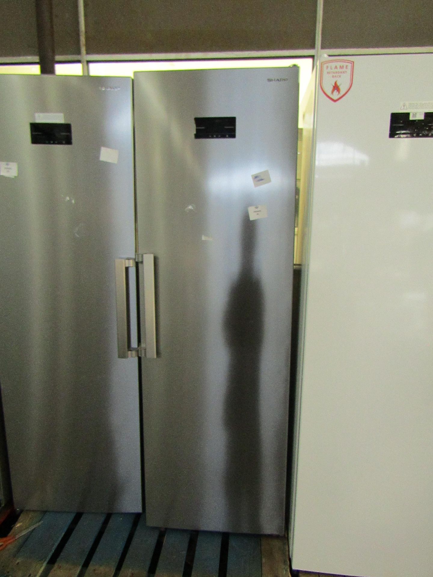 Sharp freestanding fridge, unchecked due to room temperature being too low.