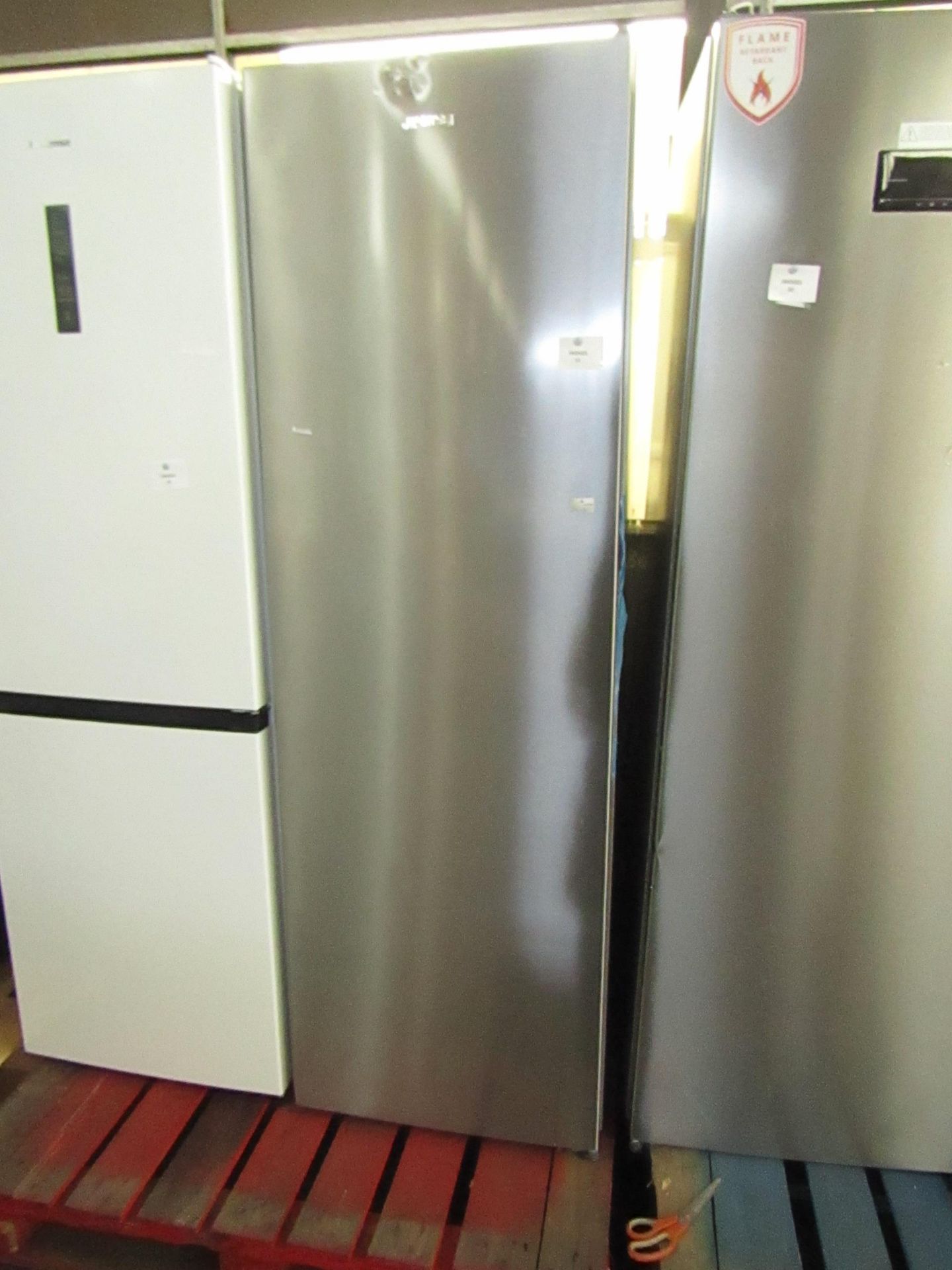 Smeg tall freestanding fridge, not getting cold and has dents on the front.