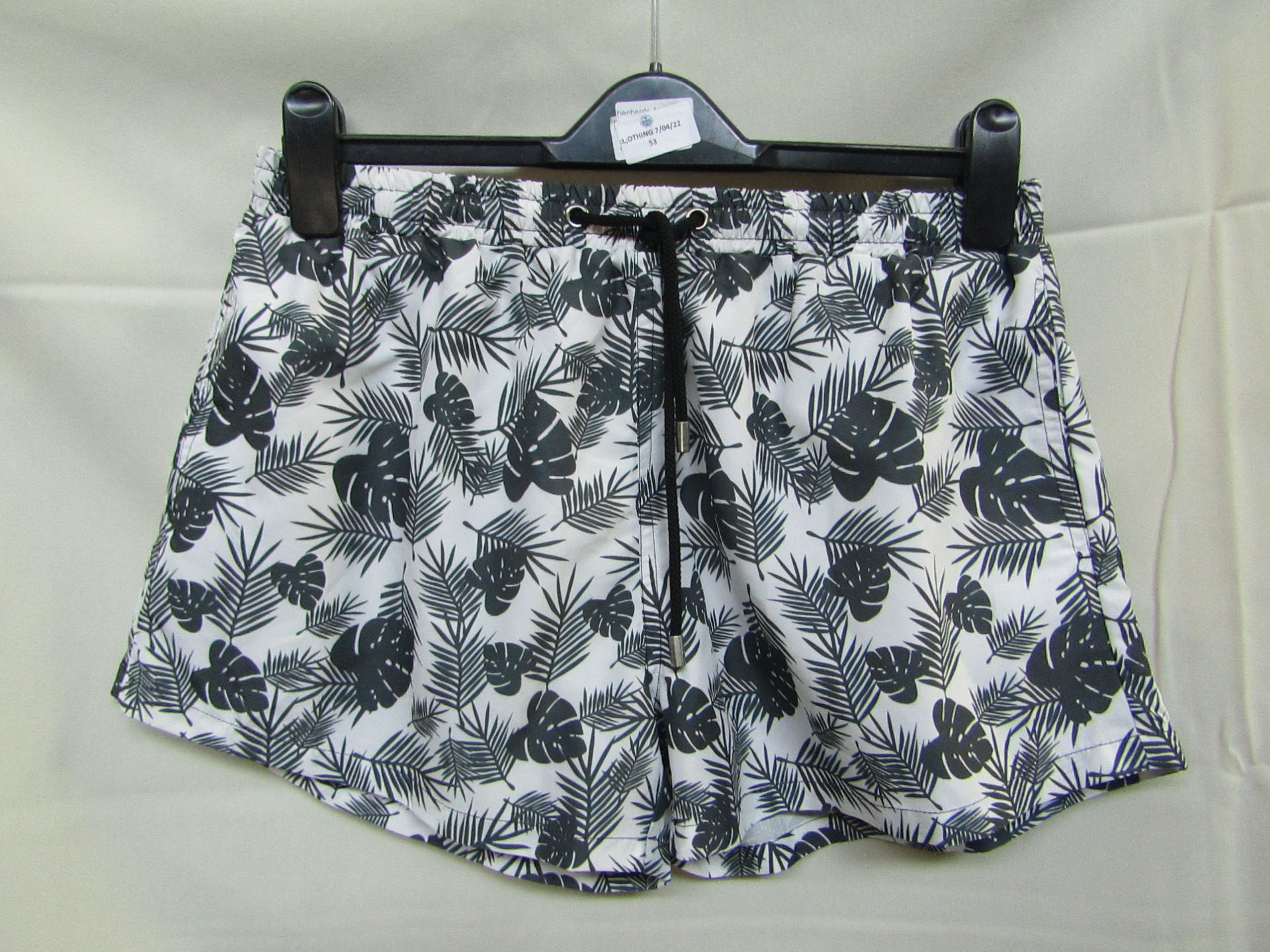 Boo Hoo Man Palm print swim shorts, no size but would estimate Medium, sample