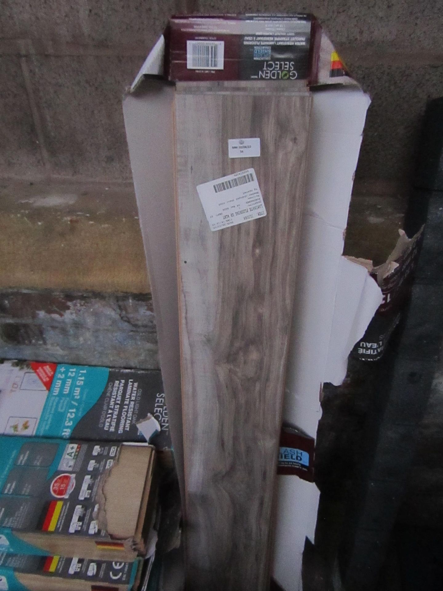 Approx 2 packs of Golden select Grey Walnut Laminate florring, please note this estimated as some