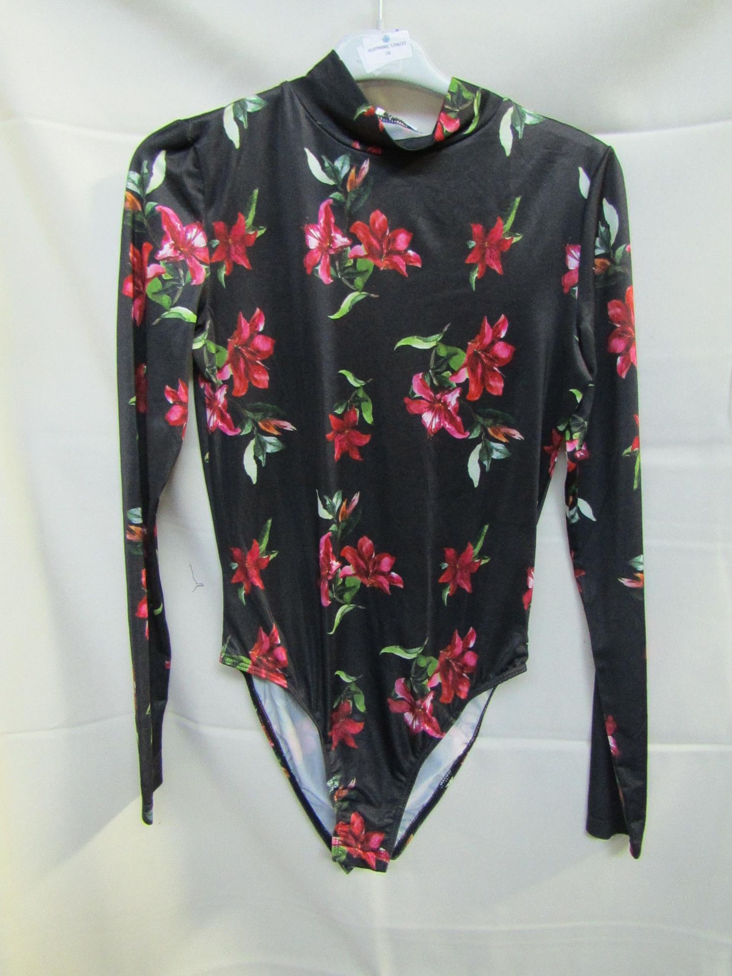 Unique 21 Floral long Sleeve body suit, size 8, sample