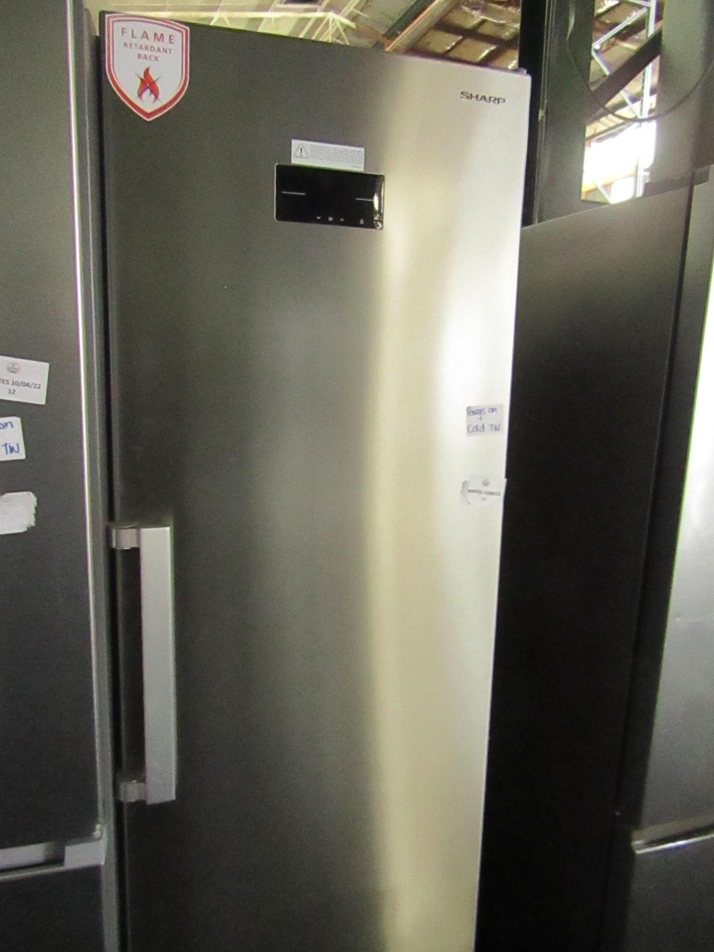 Sharp tall freestanding fridge, Clean Inside Marks Present On Bottom. - Powers On & Gets Cold.