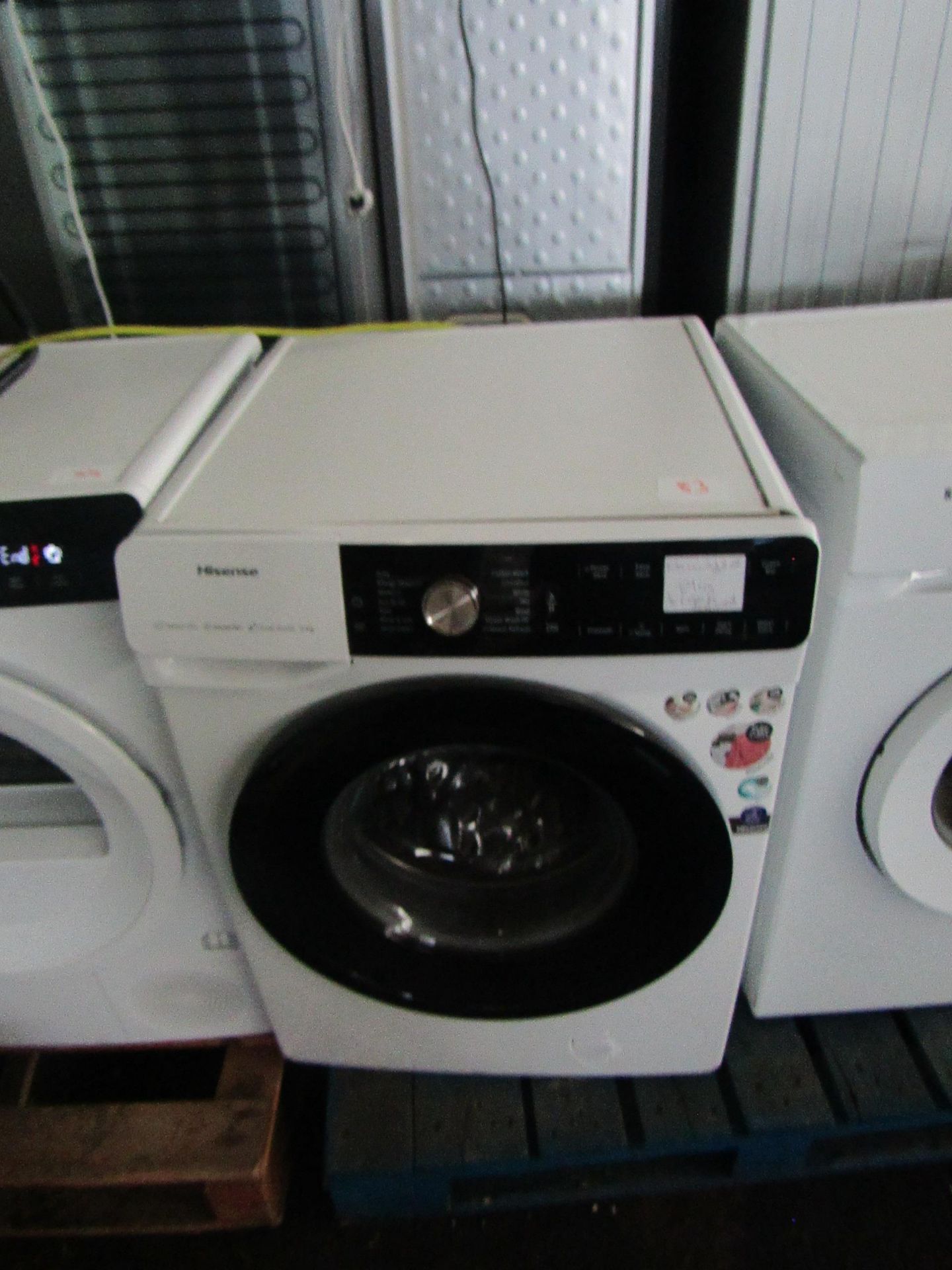 Hisense Dose Assist washing machine, spares and repairs, the front panel is coming off.