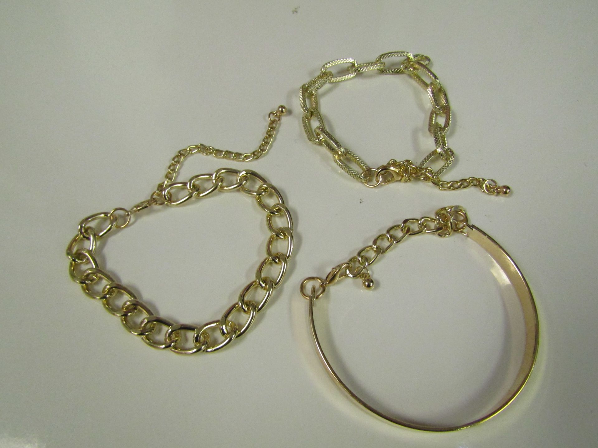 Set of 3 Different Gold Coloured Bracelets All new & Packaged
