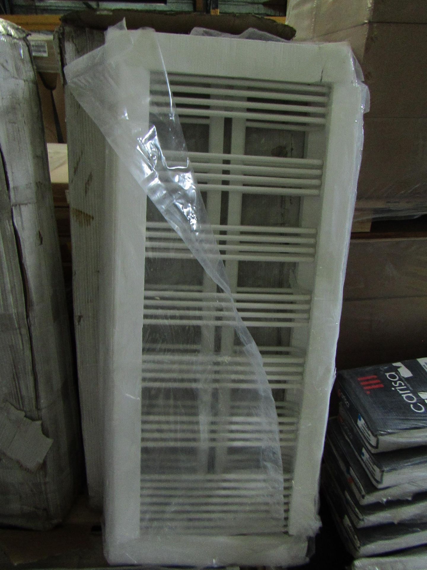 Quinn White towel radiator 560x1410, has wall Brackets, Looks new and wrapped although this is not