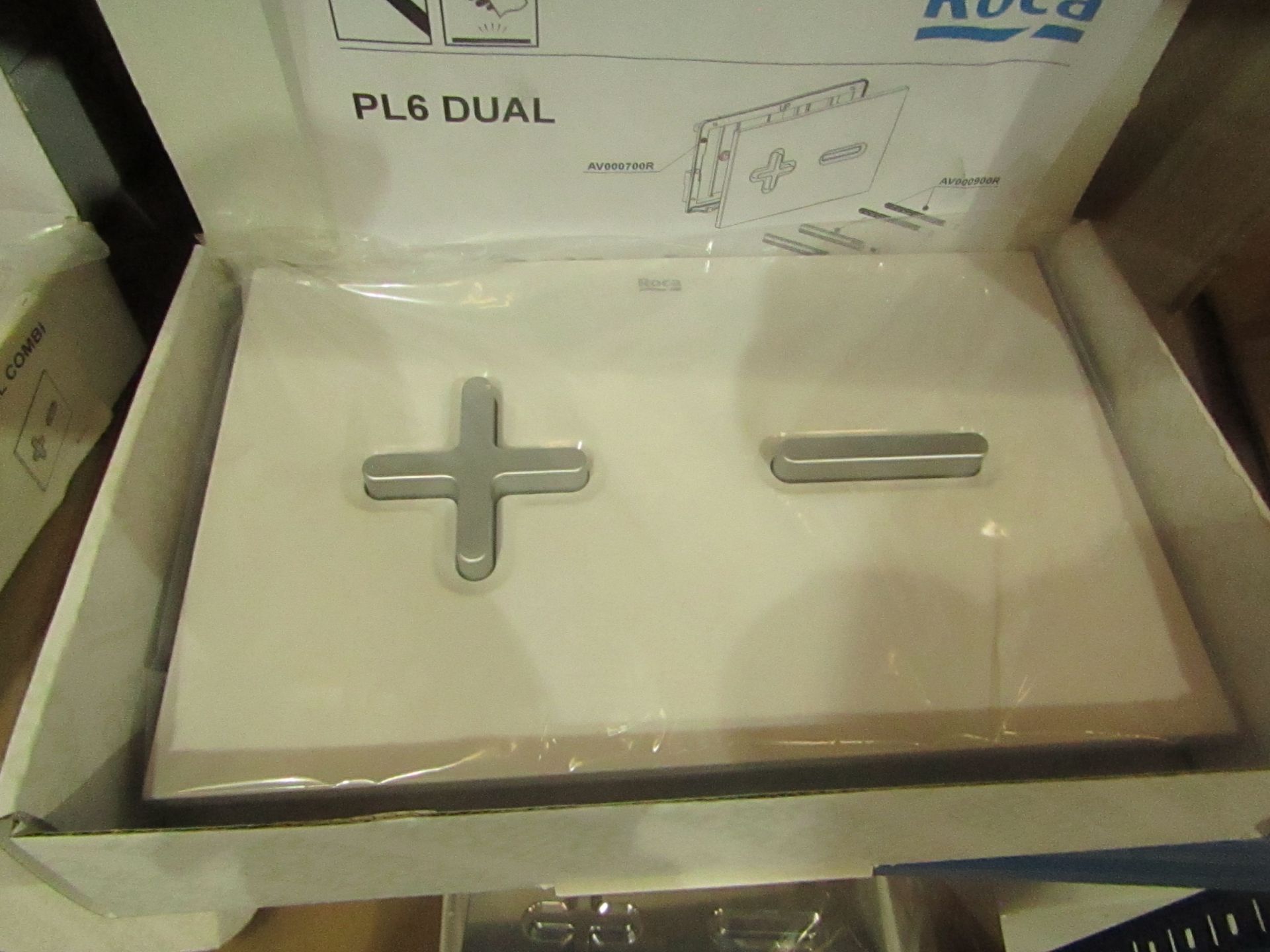 Roca PL6 Dual flush plate, new and boxed.